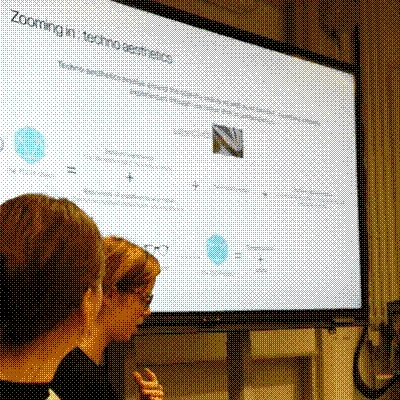 Chaline Bang & Elizabete Sadauska giving a presentation on permacomputing aesthetics 